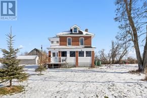 Kawartha Lakes (Verulam) apartment for rent - A house with a snowy front yard.
