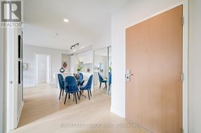 Toronto (Bay Street Corridor) condo for rent - A dining room with a table and chairs is shown in the image.