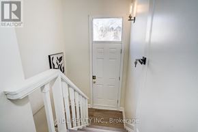 Toronto (Banbury-Don Mills) apartment for rent - A white door is in a white room.
