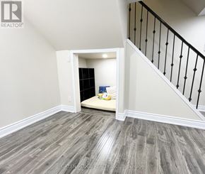 Toronto (Willowridge-Martingrove-Richview) apartment for rent - A room with a staircase and a bed in it.