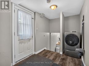 Welland (N. Welland) duplex for rent - A laundry room with a washer and dryer.