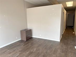 Carman apartment for rent - A room with a filing cabinet and a white wall.