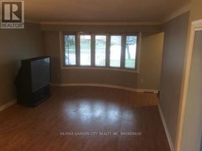 St. Catharines (Secord Woods) apartment for rent - A room with a television and a window.