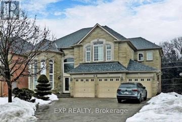 Vaughan (East Woodbridge) apartment for rent - A house with a car parked in front of it.