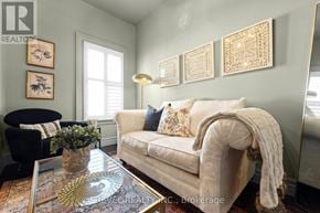 Mississauga (Streetsville) multi-family for rent - A living room with a couch, coffee table, and pictures on the wall.