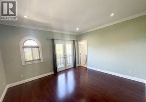Richmond apartment for rent - A room with a window and sliding glass doors.