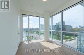 Toronto (Parkwoods-Donalda) condo for rent - A room with a view of the cityscape through large windows.