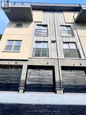 Whitby (Downtown Whitby) townhouse for rent - A building with the number 10 on the left and 9 on the right.