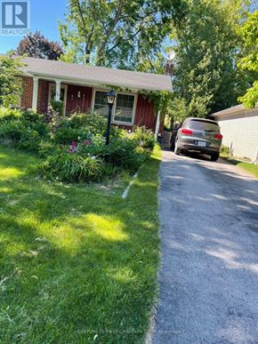 London North (North H) apartment for rent - A red house with a car parked in front.