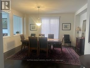 Hamilton (Waterdown) apartment for rent - A dining room with a table and chairs.