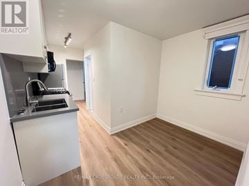 Toronto (South Riverdale) apartment for rent - A kitchen area with a sink and a window.