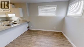 Clairmont apartment for rent - A room with a counter and a window.
