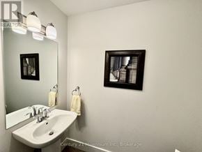 Blue Mountains apartment for rent - A bathroom with a white sink and a mirror.