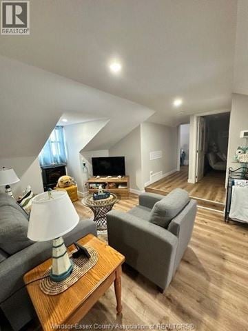 Belle River apartment for rent - A living room with a grey couch and a wooden coffee table.