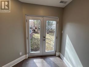 Aurora (Aurora Highlands) apartment for rent - A room with a sliding door leading to a backyard.
