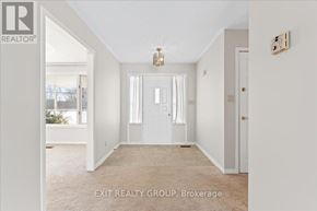Prince Edward County (Ameliasburg Ward) apartment for rent - A white room with a door and a window.