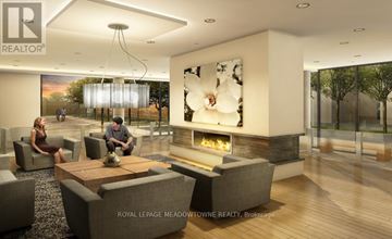 Toronto (Woodbine Corridor) condo for rent - A modern living room with a fireplace and a painting of a white flower.