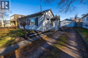 Sarnia apartment for rent - A house with a driveway in front of it.