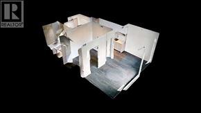 Richmond apartment for rent - A white, multi-level house with a black background.