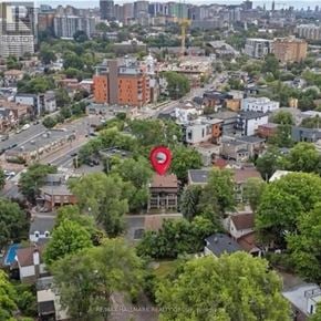 Ottawa apartment for rent - A bird's eye view of a city with a red pin marking a specific location.