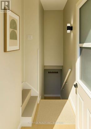 Hamilton (Huntington) apartment for rent - A hallway with a bench and a door.