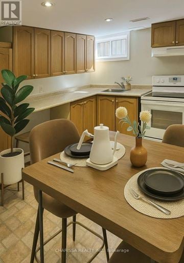 Hamilton (Huntington) apartment for rent - A kitchen with a table set for two with a vase of flowers on it.