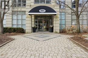 Burlington condo for rent - The entrance to a building with a black awning and the number 992 on it.