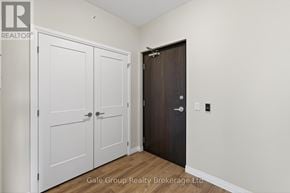 Woodstock (Woodstock - South) apartment for rent - A room with a white door and a brown door.
