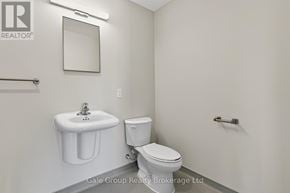 Woodstock (Woodstock - South) apartment for rent - A white sink and toilet in a small bathroom.