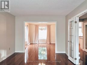 Markham (Markham Village) apartment for rent - A room with a glass table and a chandelier in the middle.