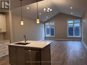 Brockville apartment for rent - A kitchen with a sink and cabinets is shown in this image.