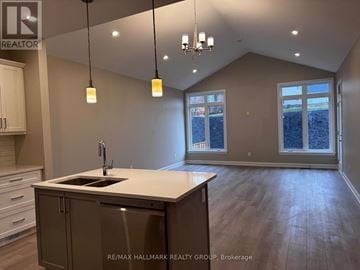 Brockville apartment for rent - A kitchen with a sink and cabinets is shown in this image.