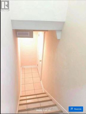 Richmond Hill (Westbrook) apartment for rent - A hallway with a sign that says "INTERNATIONAL BAY".