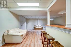 Richmond Hill (Westbrook) apartment for rent - A living room with a couch, a table, and a window.