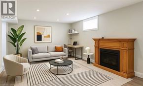 Hamilton apartment for rent - A living room with a fireplace and a couch.