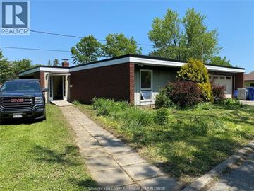 Windsor apartment for rent - A house with a black truck parked in front.