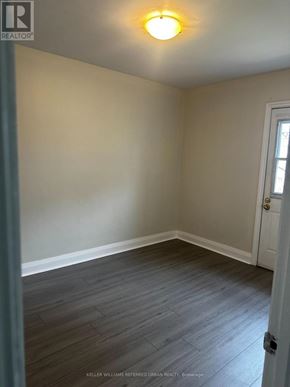 Toronto (Woodbine-Lumsden) apartment for rent - A room with a door and a window.