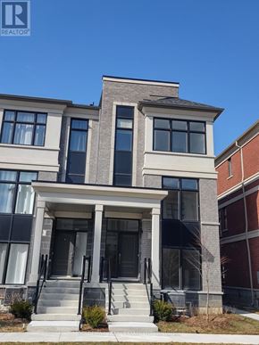 Markham (Wismer) townhouse for rent - A modern two-story house with a large front porch.