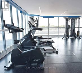 Ottawa condo for rent - A gym with treadmills and exercise equipment.