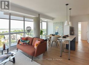 Ottawa condo for rent - A living room with a couch, chairs, and a dining table.
