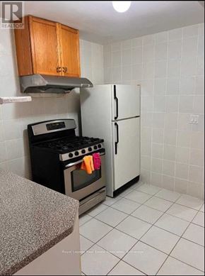 Markham (Victoria Square) apartment for rent - A kitchen with a stove, oven, and refrigerator.