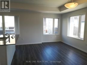 Toronto (New Toronto) townhouse for rent - A room with a window and a sink.