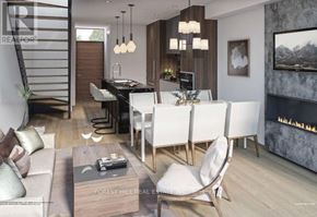 Toronto (Flemingdon Park) condo for rent - A modern living room with a fireplace and a dining area.