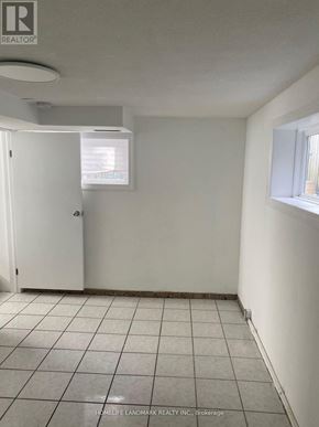 Toronto (Oakwood Village) apartment for rent - A room with white walls and a white door.