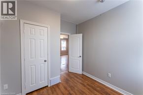 Hamilton townhouse for rent - A room with a white door and a white wall.