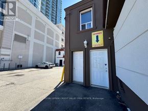 Brampton (Downtown Brampton) apartment for rent - A building entrance with a sign that says "Intrance".