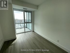 Toronto (Bayview Village) condo for rent - A room with a sliding glass door leading to a balcony.