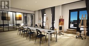 Hamilton (Lakeshore) condo for rent - A modern office space with a long table and chairs.