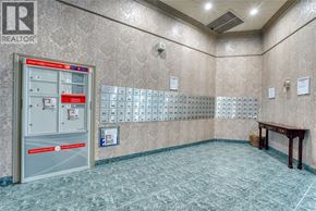 Windsor condo for rent - A room with a vending machine and a table.
