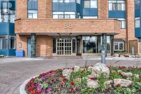 Toronto (Milliken) condo for rent - The front of a building with the number 88 on it.